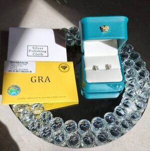 Delicate Pear Shape Moissanite earrings. Comes with GRA certification.